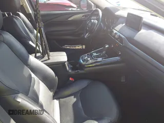 2018 Mazda CX-9 Touring with VIN JM3TCACY9J0219396, listed as a IAAI auction lot 41700710 with 123,383 mi miles and . Bid and sale history available at carsss.com. Image 5.