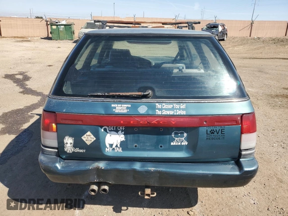 1994 Subaru Legacy L with VIN 4S3BJ6337R7955431, listed as a Copart auction lot 70200794 with 281,694 mi miles and Salvage Title. Bid and sale history available at DreamBid. Image 6.