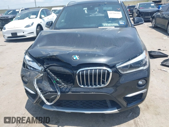 2017 BMW X1 xDrive28i with VIN WBXHT3Z30H4A65417, listed as a IAAI auction lot 42328797 with 103,788 mi miles and . Bid and sale history available at DreamBid. Image 12.