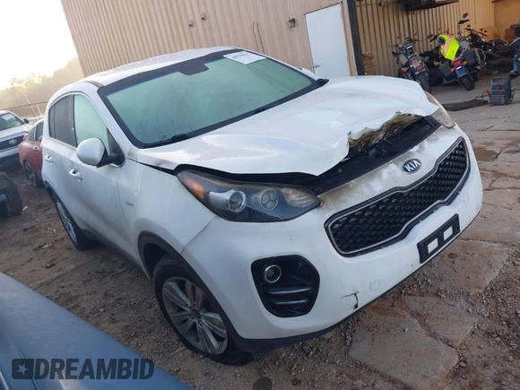 2018 Kia Sportage LX z VIN KNDPMCAC3J7394485, wystawiony jako IAAI lot #41106807 z przebiegiem 104 865 mil mil oraz . Historia ofert i sprzedaży dostępna na DreamBid. Obrazek 1.