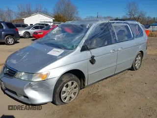 2004 Honda Odyssey EX-L with VIN 5FNRL18924B107971, listed as a IAAI auction lot 41699067 with Not Provided miles and . Bid and sale history available at DreamBid. Image 16.
