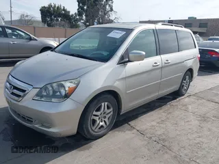 2005 Honda Odyssey EX-L with VIN 5FNRL38675B422980, listed as a IAAI auction lot 41680392 with 188,145 mi miles. Bid and sale history available at carsss.com. Image 2.
