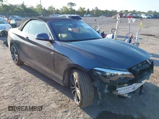 2020 BMW 2 Series 230i xDrive with VIN WBA2K1C08L7G28887, listed as a IAAI auction lot 42122785 with 30,599 mi miles and . Bid and sale history available at carsss.com. Image 1.