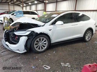 2018 Tesla Model X 75D with VIN 5YJXCBE24JF138297, listed as a IAAI auction lot 41058224 with NaN miles. Bid and sale history available at carsss.com. Image 17.
