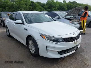 2016 Kia Optima LX with VIN 5XXGT4L31GG041619, listed as a IAAI auction lot 42603879 with 158,755 mi miles and . Bid and sale history available at DreamBid. Image 1.