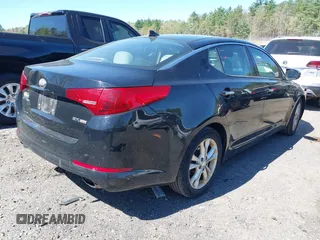 2013 Kia Optima EX with VIN 5XXGN4A77DG216998, listed as a IAAI auction lot 42102377 with 204,354 mi miles. Bid and sale history available at carsss.com. Image 4.