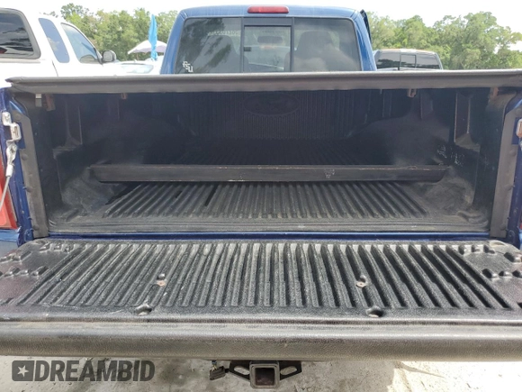 2009 Ford Ranger XL z VIN 1FTYR10D49PA41222, wystawiony jako Copart lot #58270355 z przebiegiem 142 903 mil mil oraz Szkoda całkowita • Salvage title. Historia ofert i sprzedaży dostępna na DreamBid. Obrazek 10.