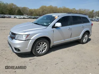 2014 Dodge Journey SXT z VIN 3C4PDCBG7ET243975, wystawiony jako Copart lot #50775675 z przebiegiem 150 996 mil mil oraz Czysty tytuł • Clean title. Historia ofert i sprzedaży dostępna na DreamBid. Obrazek 1.
