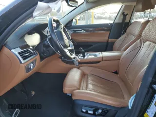 2020 BMW 7 Series 740i xDrive with VIN WBA7T4C04LCD18344, listed as a Copart auction lot 82823384 with Not provided miles and Salvage title. Bid and sale history available at DreamBid. Image 7.