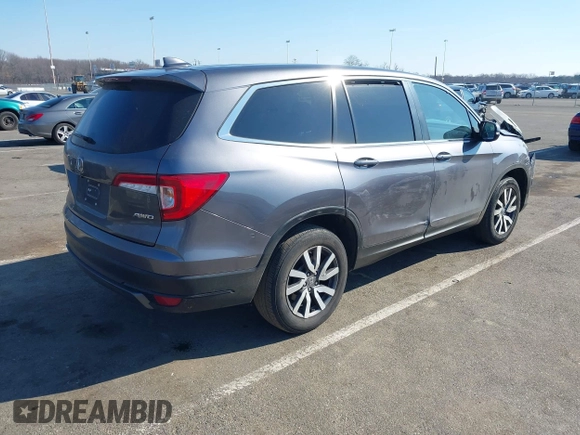 2021 Honda Pilot EX-L with VIN 5FNYF6H54MB028203, listed as a IAAI auction lot 41641116 with 46,755 mi miles and . Bid and sale history available at DreamBid. Image 4.