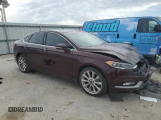 2017 Ford Fusion Titanium with VIN 3FA6P0D94HR345757, listed as a Copart auction lot 48789625 with 83,239 mi miles and Salvage title. Bid and sale history available at DreamBid. Image 4.