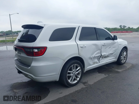 2021 Dodge Durango R/T with VIN 1C4SDHCT3MC572704, listed as a IAAI auction lot 41989456 with 71,260 mi miles and . Bid and sale history available at DreamBid. Image 4.