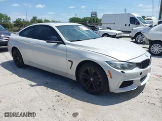 2015 BMW 4 Series 428i xDrive with VIN WBA3N5C58FK198825, listed as a IAAI auction lot 41919172 with 125,421 mi miles. Bid and sale history available at carsss.com. Image 1.