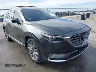 2023 Mazda CX-9 Grand Touring z VIN JM3TCBDY0P0631395, wystawiony jako IAAI lot #41449555 z przebiegiem 17 721 mil mil oraz . Historia ofert i sprzedaży dostępna na DreamBid. Obrazek 1.