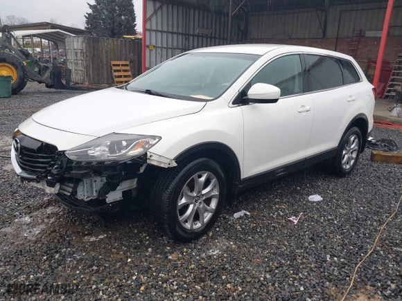 2015 Mazda CX-9 Touring with VIN JM3TB2CA1F0449033, listed as a IAAI auction lot 41549205 with 95,106 mi miles. Bid and sale history available at carsss.com. Image 2.