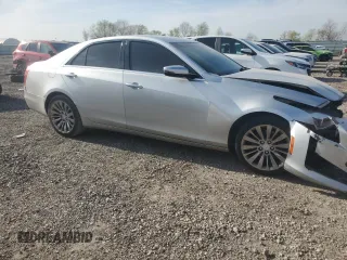 2014 Cadillac CTS Luxury AWD with VIN 1G6AX5SX9E0141473, listed as a Copart auction lot 49163265 with 142,361 mi miles and Salvage Title. Bid and sale history available at DreamBid. Image 4.