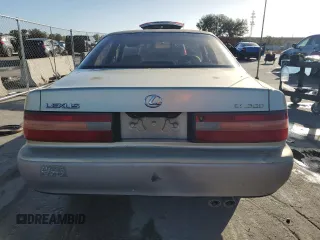 1995 Lexus ES 300 with VIN JT8GK13T6S0101694, listed as a Copart auction lot 77683754 with 247,984 mi miles and Salvage Title. Bid and sale history available at DreamBid. Image 6.