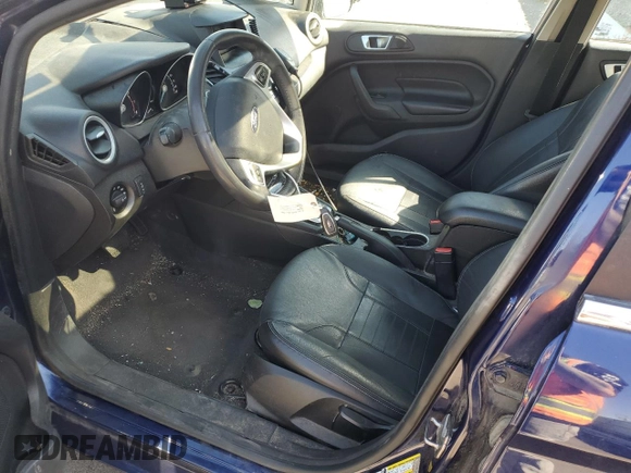 2016 Ford Fiesta Titanium z VIN 3FADP4CJ7GM157983, wystawiony jako Copart lot #75773954 z przebiegiem 149 363 mil mil oraz Szkoda całkowita • Salvage title. Historia ofert i sprzedaży dostępna na DreamBid. Obrazek 7.