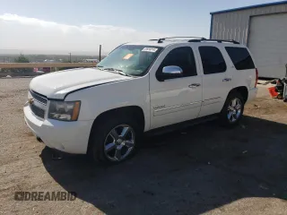 2013 Chevrolet Tahoe LTZ with VIN 1GNSKCE06DR202587, listed as a Copart auction lot 75394984 with 138,706 mi miles and Salvage title. Bid and sale history available at DreamBid. Image 1.