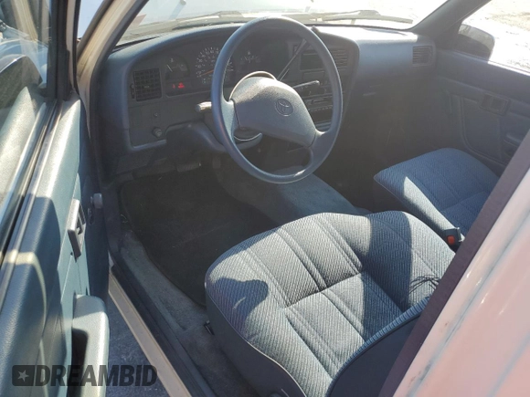 1993 Toyota Pickup DLX z VIN JT4RN93PXP5085030, wystawiony jako Copart lot #73537044 z przebiegiem 175 167 mil mil oraz Szkoda całkowita • Salvage title. Historia ofert i sprzedaży dostępna na DreamBid. Obrazek 8.