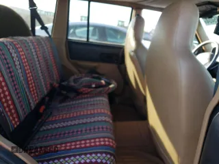 2001 Jeep Cherokee Sport with VIN 1J4FT48S61L522723, listed as a Copart auction lot 87115404 with 0 mi miles and Clean Title. Bid and sale history available at carsss.com. Image 11.