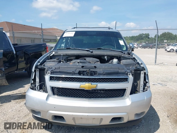 2013 Chevrolet Tahoe LS with VIN 1GNSCAE08DR153829, listed as a IAAI auction lot 42742266 with 216,821 mi miles and . Bid and sale history available at DreamBid. Image 12.