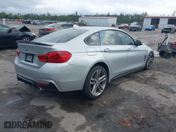 2018 BMW 4 Series 440i with VIN WBA4J5C57JBF07227, listed as a IAAI auction lot 41562986 with 76,316 mi miles and . Bid and sale history available at DreamBid. Image 4.