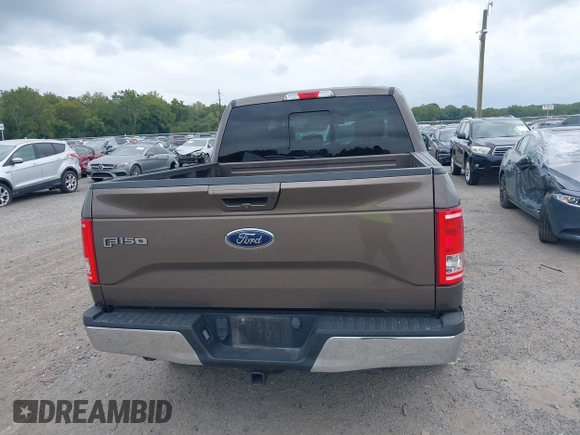 2015 Ford F-150 XLT with VIN 1FTEW1EP1FFC72160, listed as a IAAI auction lot 40351662 with 142,647 mi miles. Bid and sale history available at carsss.com. Image 16.