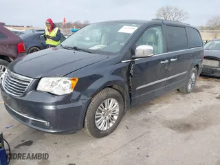 2014 Chrysler Town & Country Touring-L 30th Anniversary with VIN 2C4RC1CG4ER133192, listed as a IAAI auction lot 41113205 with 191,964 mi miles. Bid and sale history available at carsss.com. Image 17.