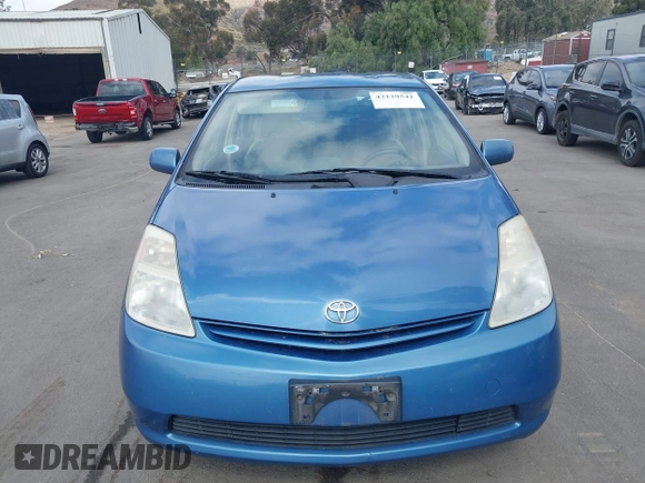 2005 Toyota Prius with VIN JTDKB20U957040822, listed as a IAAI auction lot 42129542 with 214,455 mi miles. Bid and sale history available at carsss.com. Image 6.