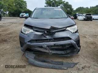 2018 Toyota RAV4 LE z VIN JTMBFREV1JJ219111, wystawiony jako Copart lot #69426224 z przebiegiem 89 555 mil mil oraz Nie do naprawy • Non repairable. Historia ofert i sprzedaży dostępna na DreamBid. Obrazek 5.