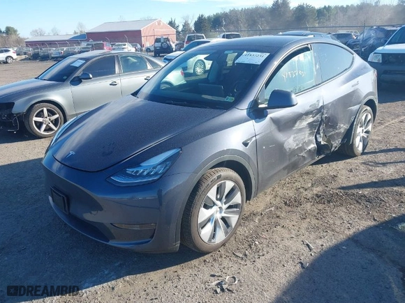 2023 Tesla Model Y Long Range with VIN 7SAYGDEE8PA140562, listed as a IAAI auction lot 41837231 with 30,847 mi miles. Bid and sale history available at carsss.com. Image 2.