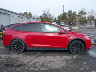 2022 Tesla Model X Plaid with VIN 7SAXCBE60NF330246, listed as a IAAI auction lot 41477394 with 51,612 mi miles and . Bid and sale history available at carsss.com. Image 13.