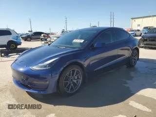 2022 Tesla Model 3 with VIN 5YJ3E1EA8NF322335, listed as a Copart auction lot 48187265 with 22,265 mi miles and Clean Title. Bid and sale history available at DreamBid. Image 1.