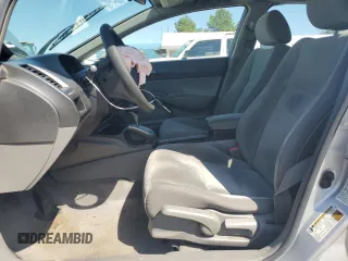 2010 Honda Civic LX with VIN 19XFA1F51AE016877, listed as a Copart auction lot 52275475 with 217,152 mi miles and Salvage Title. Bid and sale history available at DreamBid. Image 7.