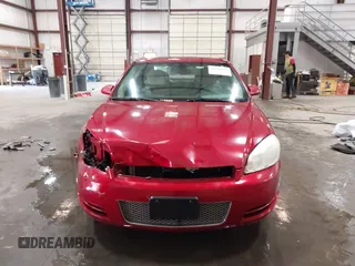 2013 Chevrolet Impala LT with VIN 2G1WG5E30D1258088, listed as a IAAI auction lot 42088699 with 145,416 mi miles and . Bid and sale history available at DreamBid. Image 12.