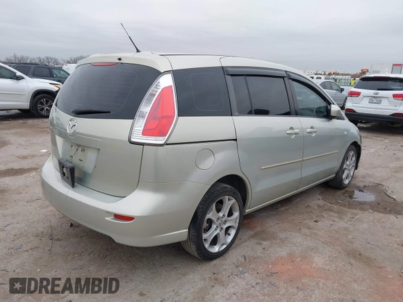 2008 Mazda 5 Sport with VIN JM1CR293080303089, listed as a IAAI auction lot 41434166 with 127,573 mi miles and . Bid and sale history available at carsss.com. Image 4.
