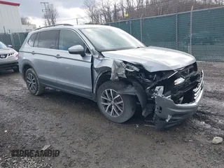 2020 Volkswagen Tiguan SE with VIN 3VV2B7AX2LM042731, listed as a IAAI auction lot 41645891 with 69,661 mi miles and . Bid and sale history available at DreamBid. Image 1.