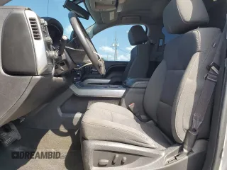 2015 Chevrolet Silverado 1500 LT with VIN 3GCUKREC9FG433906, listed as a Copart auction lot 52495785 with 99,268 mi miles and Salvage Title. Bid and sale history available at DreamBid. Image 7.