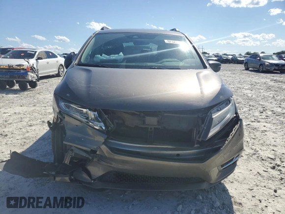 2019 Honda Odyssey Elite z VIN 5FNRL6H97KB078414, wystawiony jako Copart lot #57327895 z przebiegiem 119 259 mil mil oraz Szkoda całkowita • Salvage title. Historia ofert i sprzedaży dostępna na DreamBid. Obrazek 5.