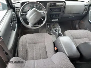 2000 Jeep Cherokee Classic with VIN 1J4FF58S8YL119611, listed as a Copart auction lot 57255685 with 148,908 mi miles and Clean title. Bid and sale history available at DreamBid. Image 8.