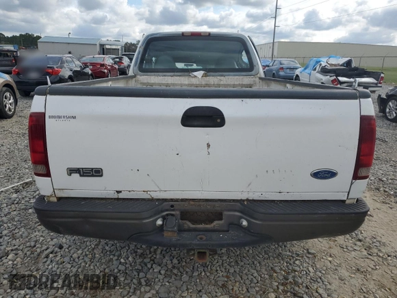 1997 Ford F-150 with VIN 1FTDF17W0VNC92212, listed as a Copart auction lot 74321454 with 242,523 mi miles and Salvage title. Bid and sale history available at DreamBid. Image 6.