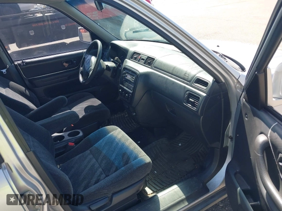 1999 Honda CR-V EX with VIN JHLRD1860XC056641, listed as a IAAI auction lot 42018329 with 321,707 mi miles. Bid and sale history available at carsss.com. Image 5.
