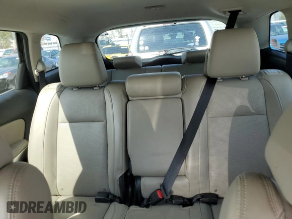 2013 Mazda CX-9 Grand Touring z VIN JM3TB3DA7D0406415, wystawiony jako Copart lot #51395995 z przebiegiem 104 817 mil mil oraz Szkoda całkowita • Salvage title. Historia ofert i sprzedaży dostępna na DreamBid. Obrazek 10.