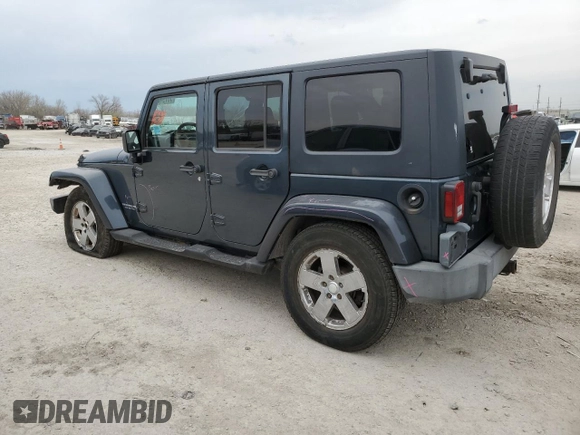 2007 Jeep Wrangler Unlimited Sahara z VIN 1J4GB59147L165439, wystawiony jako Copart lot #50794065 z przebiegiem 255 385 mil mil oraz Szkoda całkowita • Salvage title. Historia ofert i sprzedaży dostępna na DreamBid. Obrazek 2.