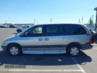 2000 Dodge Caravan SE with VIN 1B4GP44G1YB680819, listed as a IAAI auction lot 42057681 with 23,422 mi miles. Bid and sale history available at carsss.com. Image 13.