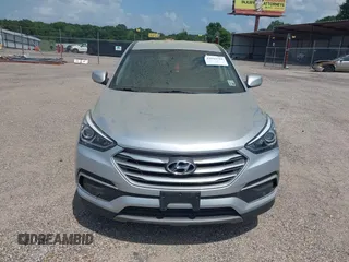 2018 Hyundai Santa Fe 2.4L with VIN 5XYZT3LB4JG557373, listed as a IAAI auction lot 42511741 with 142,572 mi miles and . Bid and sale history available at DreamBid. Image 13.