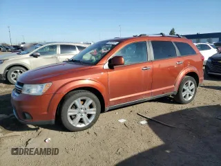 2012 Dodge Journey R/T with VIN 3C4PDDFGXCT300814, listed as a Copart auction lot 49006455 with 141,501 mi miles and Salvage title. Bid and sale history available at DreamBid. Image 1.