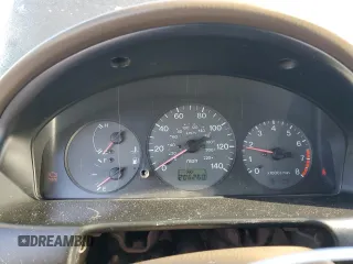 1999 Mazda Protege DX z VIN JM1BJ2227X0106522, wystawiony jako Copart lot #52423565 z przebiegiem 206 260 mil mil oraz Szkoda całkowita • Salvage title. Historia ofert i sprzedaży dostępna na DreamBid. Obrazek 9.