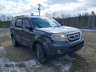 2011 Honda Pilot Touring with VIN 5FNYF4H98BB016012, listed as a IAAI auction lot 41634844 with 202,160 mi miles. Bid and sale history available at carsss.com. Image 1.